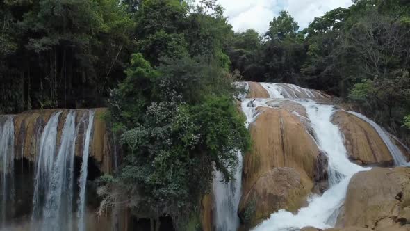 Drone shot of a waterfall in Cascadas de Agua Azul alt