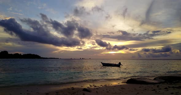 Luxury aerial tourism shot of a sunshine white sandy paradise beach and aqua blue ocean background i alt