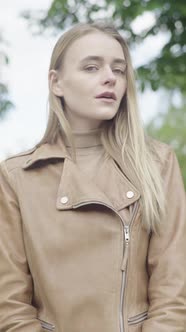 Vertical Video of a Young Skinny Girl in the Park alt