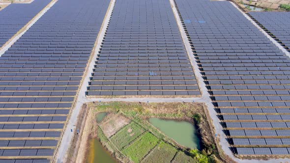 Eco Power Save Earth Solar power plant and 4K aerial view. Renewable energy. Green tech. alt