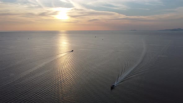 A boat go and another back from sea alt