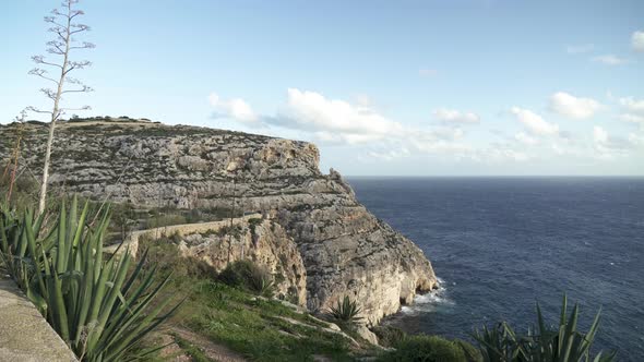 Distant Horizon with Hill Ending in Mediterranean Sea near Blue Grotto in Malta