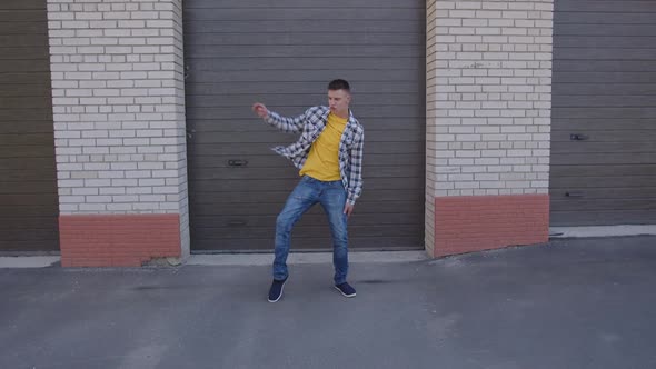 Fast Moves of Young Man Who Dancing alt