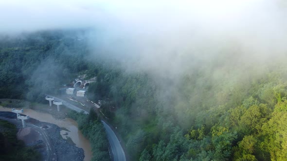 Highway Construction In The Foggy Mountains