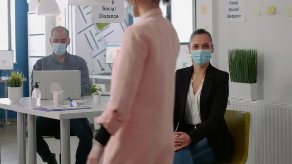 Portrait of Entrepreneur Woman Wearing Protective Face Mask to Avoid Global Epidemic alt