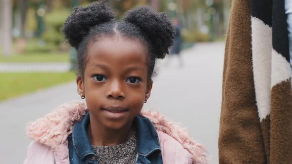 Close Up Happy Child Walk with Mom in Park Daughter and Mother Smiling Happily Looking at Camera alt