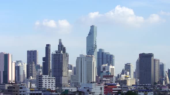 panning shot of modern building with sky in Bangkok, Thailand