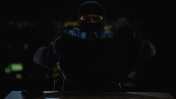 Criminal Offender Pouring Out Dollars From Big Bag, Payment for Murder, Hacking alt