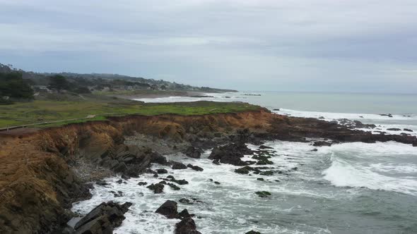 Flying Over Rocky Beach Shores of the California Coast Along Highway 1 alt