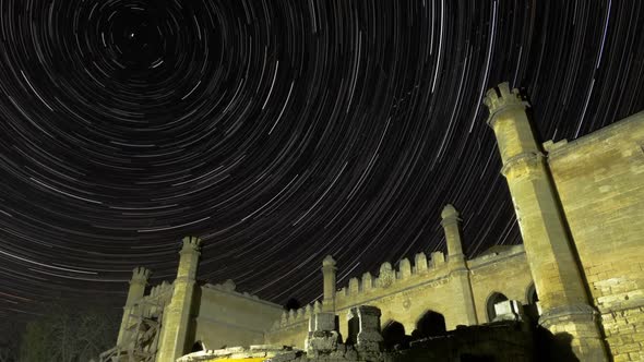 Star Trails Over Scenic Abandoned Ruin of Building alt