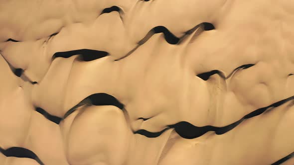  Aerial Top Down of a Desert Nature. Amazing Texture of Golden Sand Dunes Hill alt