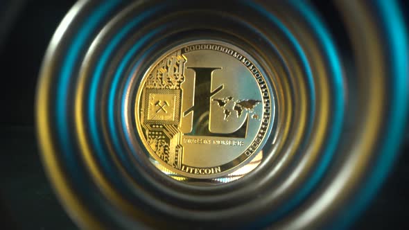 Gold Litecoin in the Center of Tunnel with Cold and Warm Light. Blockchain Technology. Crypto alt
