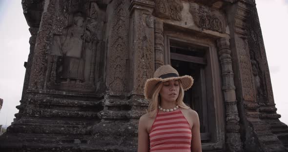 Stunning Young Female Models on the Backdrop of an Astonishing Structure alt