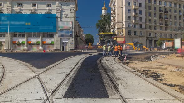 Asphalt Paver, Roller and Truck on the Road Repair Site During Asphalting Timelapse. Road alt