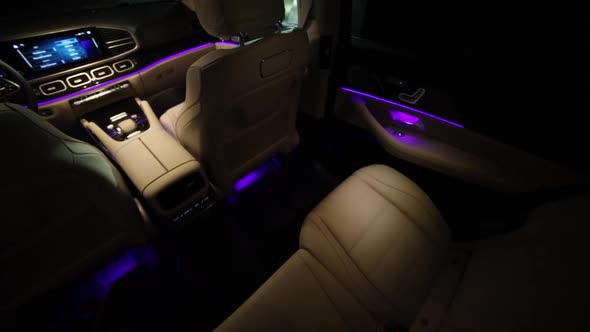Premium SUV Interior with Wood Trim Ambient Atmospheric Lighting at Night alt