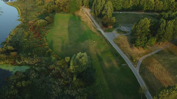 City Park. Stone Amphitheater. Winding Footpaths Are Visible. Aerial Photography.