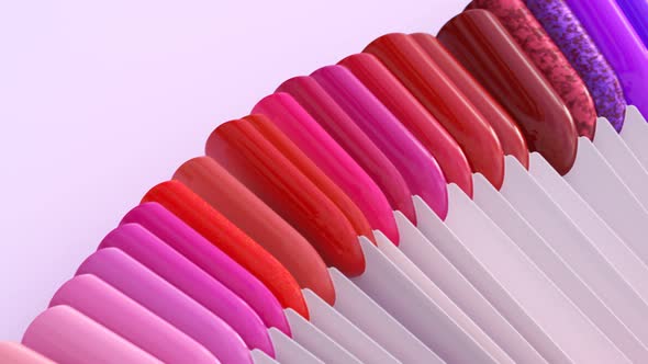 Seamless looping animation of nail polish arranged in a circle. Bright colours. alt