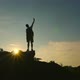 Silhouette Of Winner standing On The Peak Of The Mountain - VideoHive Item for Sale