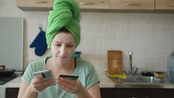 Woman Got Out of the Shower and Makes Purchases in the Online Store Using the Phone