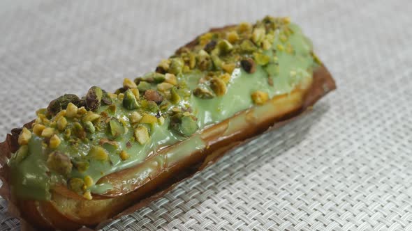Pistachio Eclair with Nut Pieces and Custard