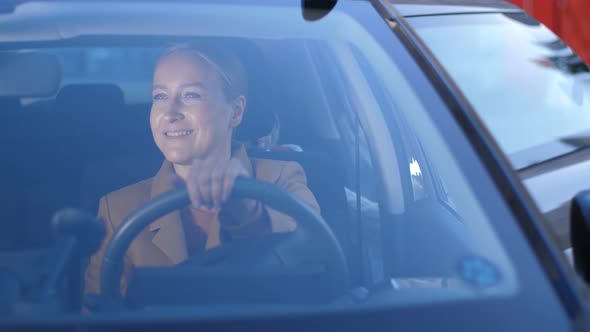 Joyful Mom Taking Girl Home After School By Car alt