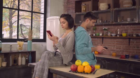 Girlfriend and Boyfriend Working in Flat in the Morning alt