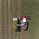 Top down aerial view of Combine harvesting and truck on wheat field. 18 - VideoHive Item for Sale