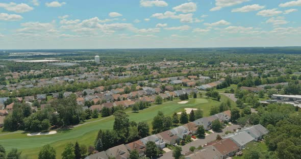 Aerial view of American residential district at suburban development alt
