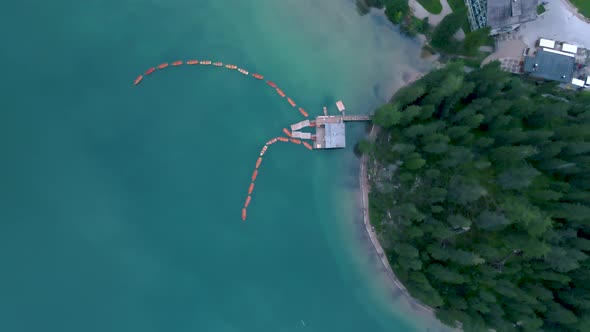 Beautiful Landscape of Braies Lake Lago Di Braies Romantic Place with Wooden Bridge and Boats on the alt