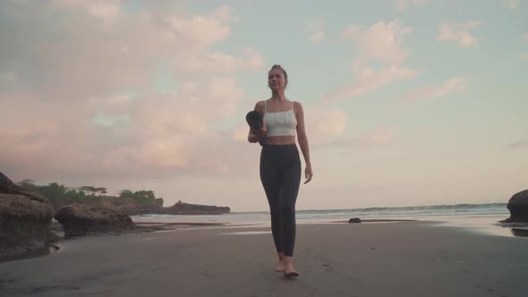 Yoga Girl Walking on Sandy Beach alt