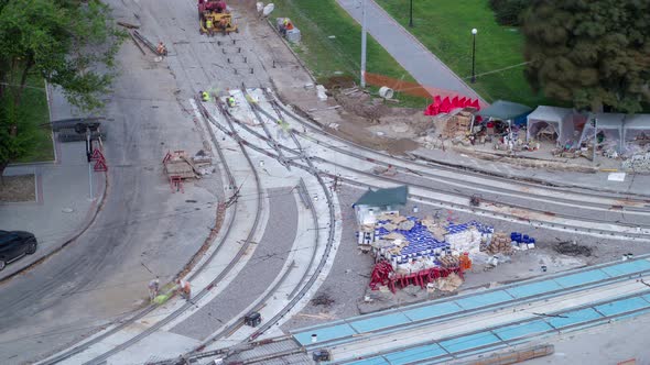 Road Construction Site with Tram Tracks Repair and Maintenance Aerial Timelapse alt