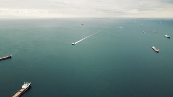 aerial view of cargo ships on Marmara Sea in a cold day alt