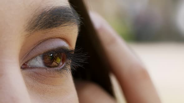 Closeup Shot Of Brown Female Eye Young Woman Posing Outdoors alt