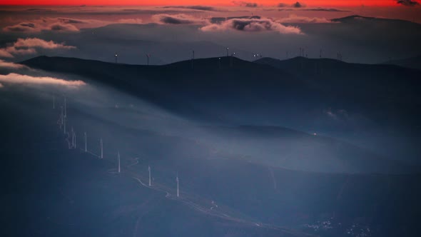 Wind Turbines at Sunset in Mountains, Portugal.