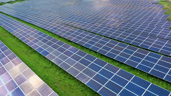 Aerial view of photovoltaic farm as a renewable energy source. alt