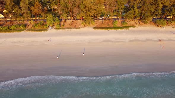 Tropical Sandy Beach at Sunset Aerial