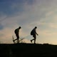 Silhouette Hikers Walking On The Mountain With Sunset - VideoHive Item for Sale