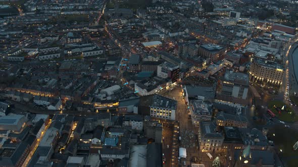 Londonderry / Derry / Stroke City / Legenderry night time aerial footage in UHD. Cityscapes of the P alt