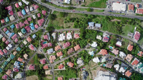 Top view down on the roofs of houses in greenery (Rodney Bay, Saint Lucia)