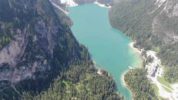 Flying over the famous Lago di Braies (Pragser Wildsee lake), Dolomites, Italy alt