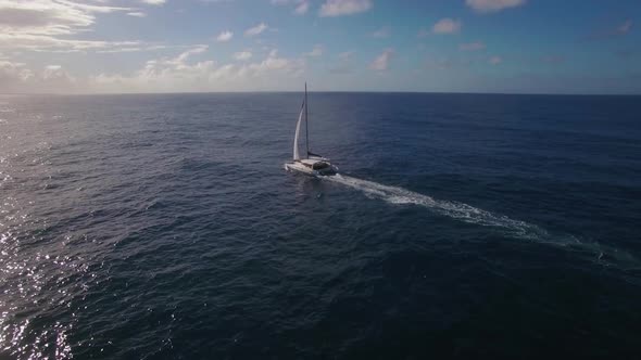 Ocean Skyline and Sailing Yacht, Aerial View alt