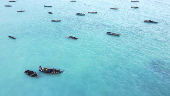 Boats in the Ocean Near the Coast of Zanzibar Tanzania alt
