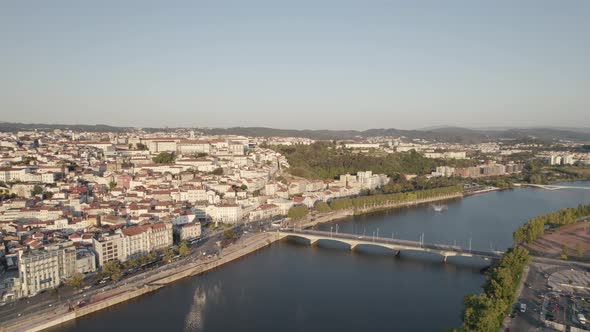 Mondego River and Santa Clara bridge with Coimbra University town in background, Portugal. alt