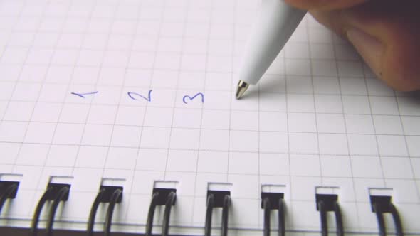 Ball Point Pen Biro Writing Numbers In A Notebook