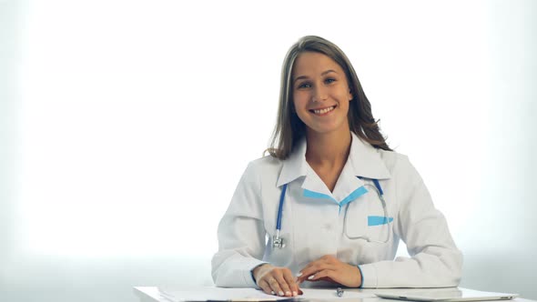 Friendly Female Doctor Smiling alt