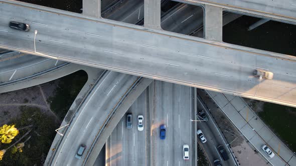 Aerial shot of a 4 level freeway interchange in Los Angeles alt