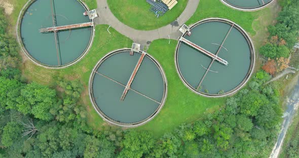 Aerial Panoramic View of Water Treatment Facilities Sewage Treatment Plantwith Round Sedimentation alt
