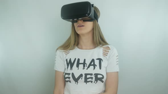 Young Sexy Girl Using Modern Helmet Virtual Reality alt
