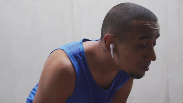 Side view man with prosthetic leg resting alt