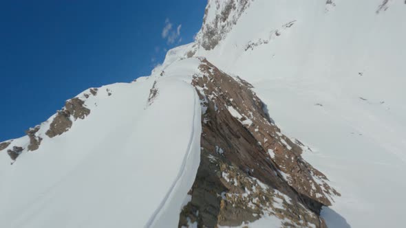 Aerial View Fpv Drone Cinematic Natural Wild Mountain Dive Snowy Peak alt